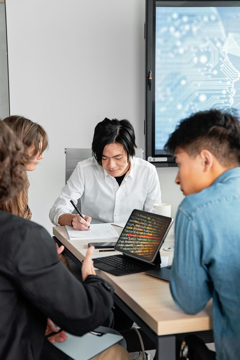 apHarmony team working together in the office